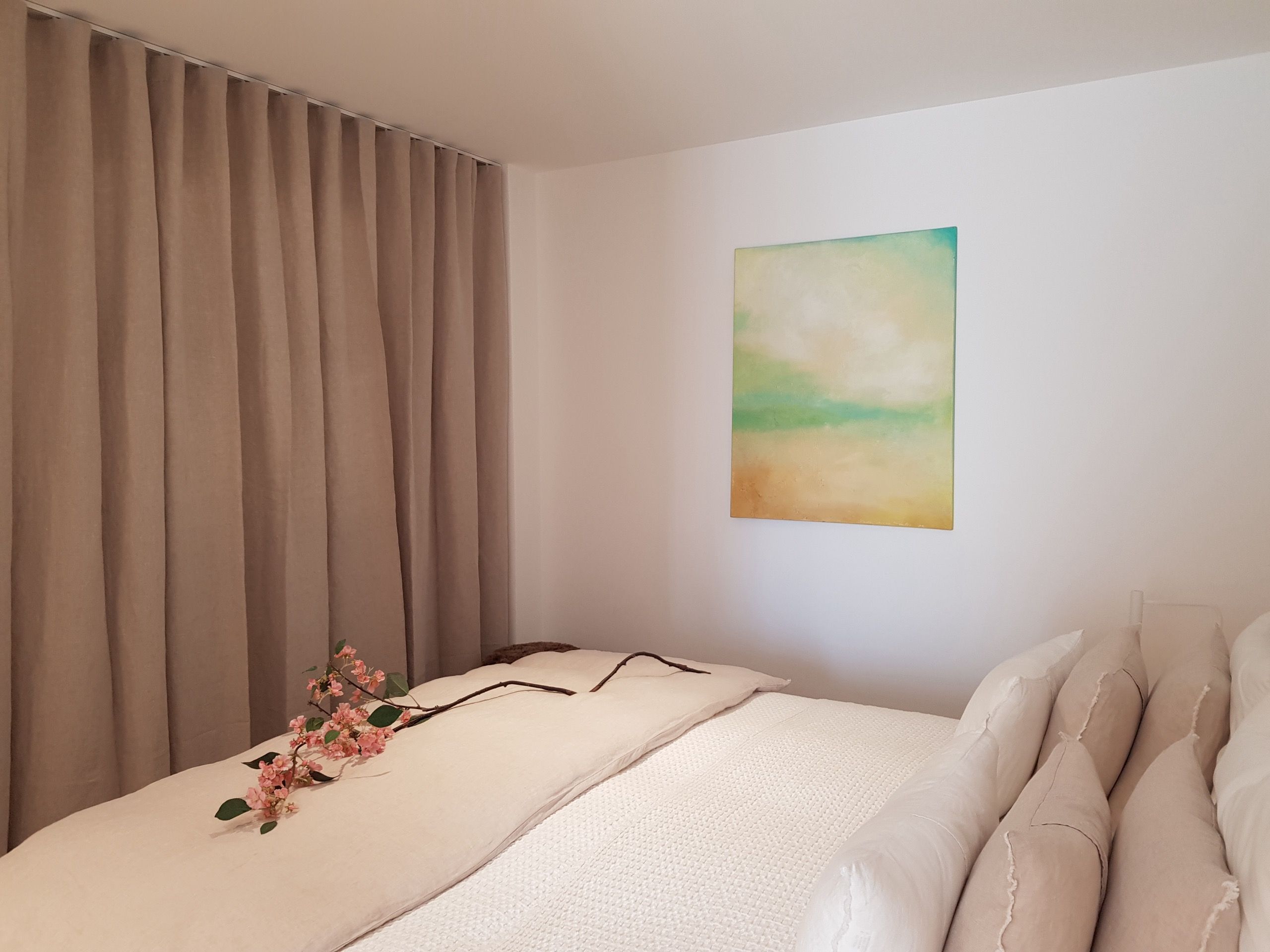 Wave-pleated linen curtain in a Palma apartment, Mallorca