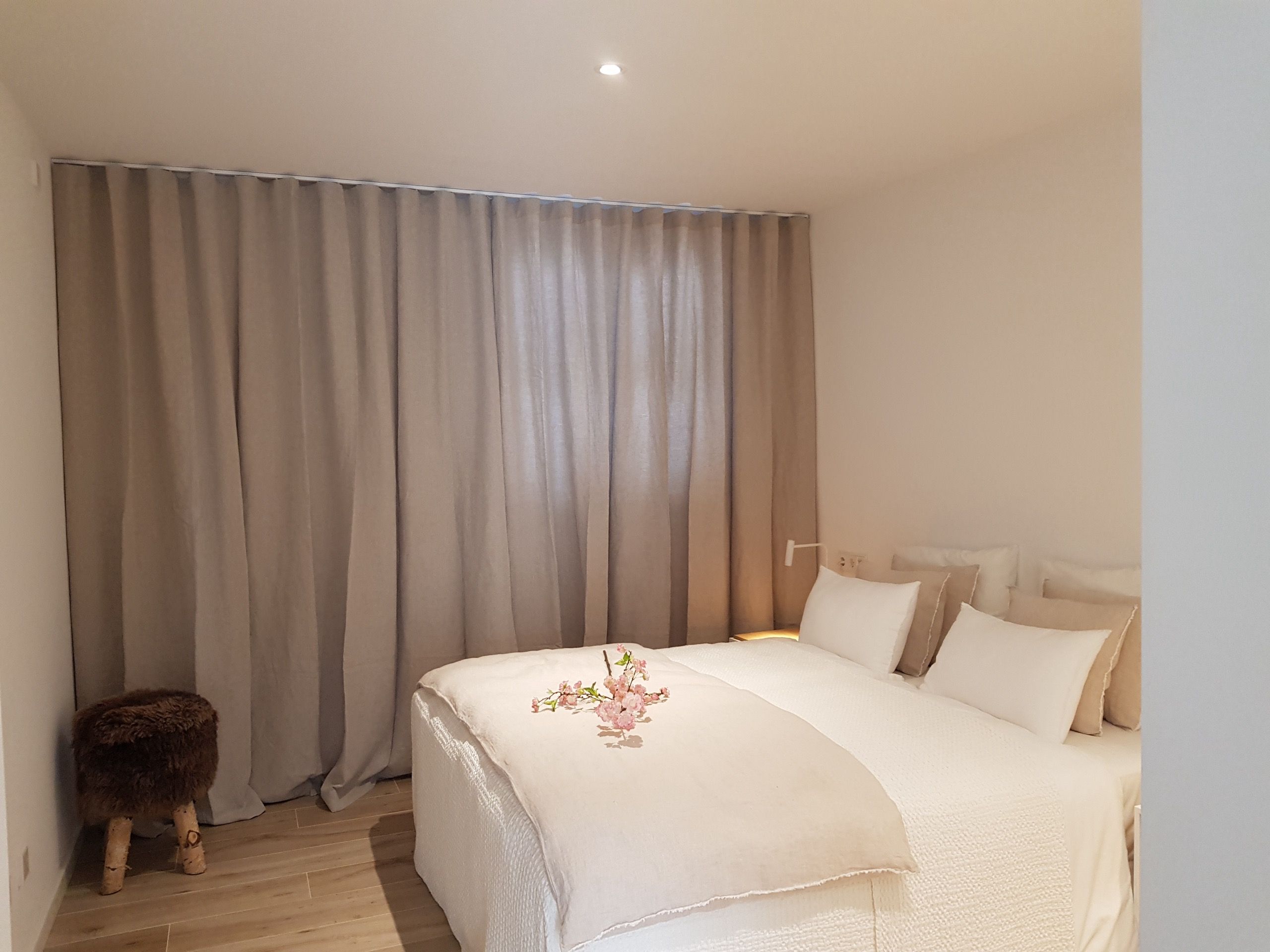 Living room fitted with linen curtains in Palma, Mallorca