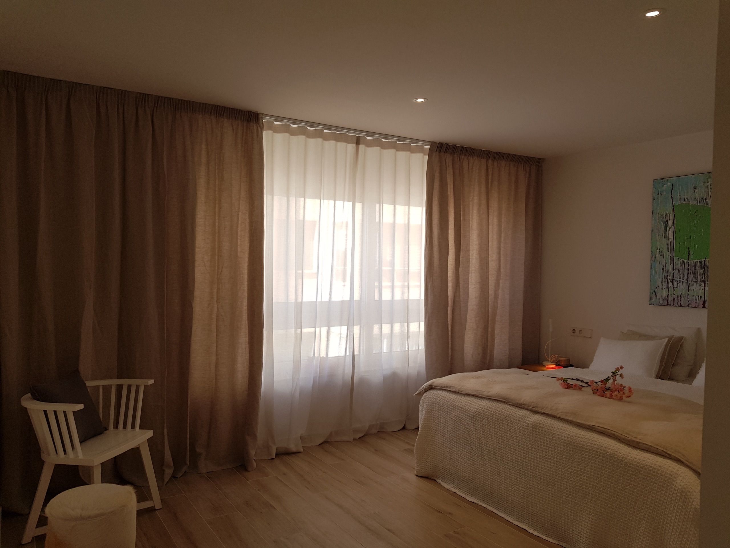 Traditional linen curtain with wave pleating in Palma, Mallorca