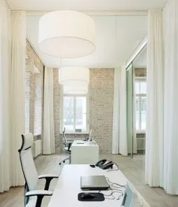 Dividing a workspace with a traditional curtain