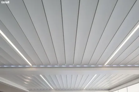 LED strip lighting integrated into a bioclimatic pergola