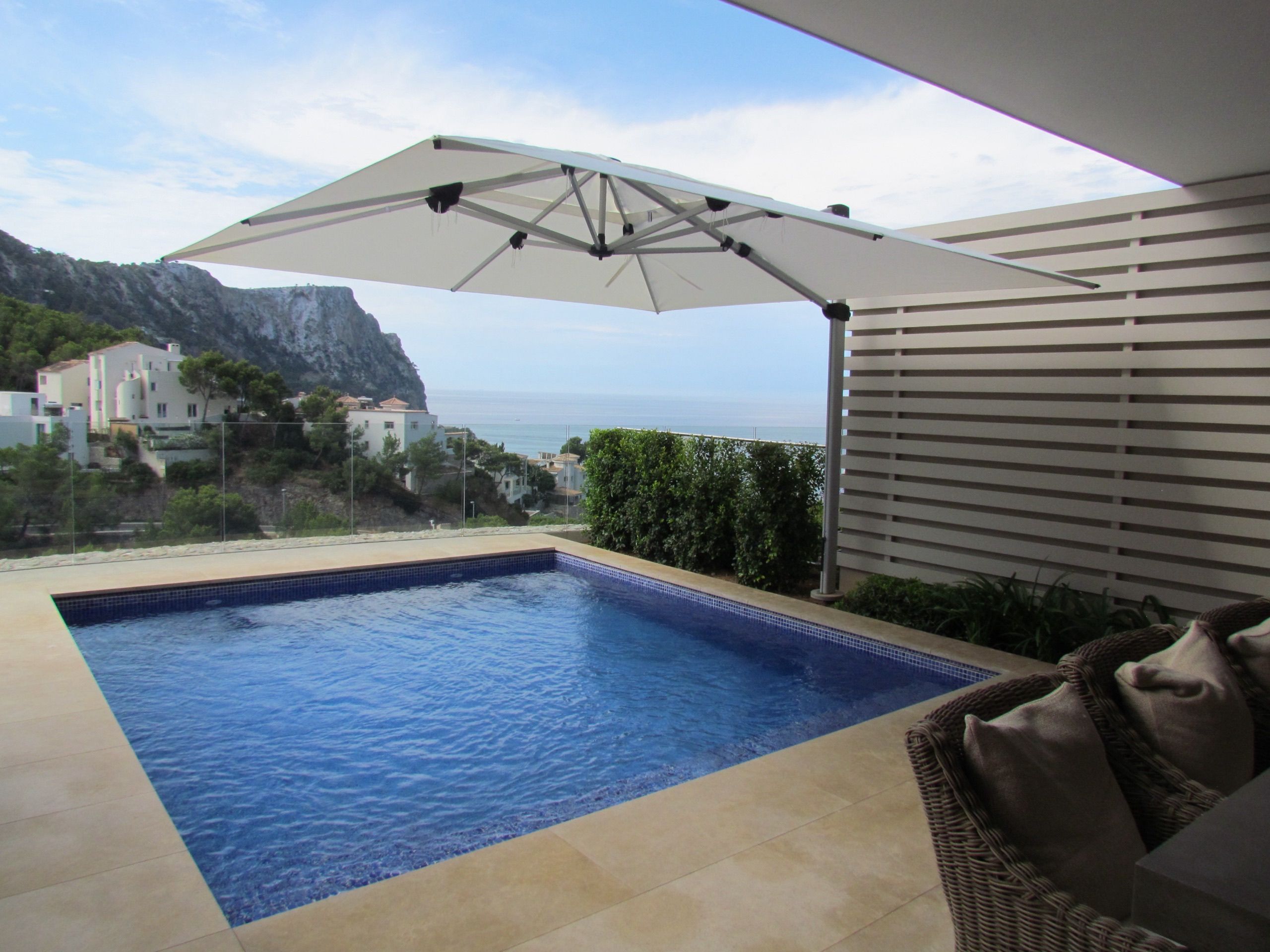 Stylish parasol providing shade on a terrace in Puerto de Andratx, Mallorca