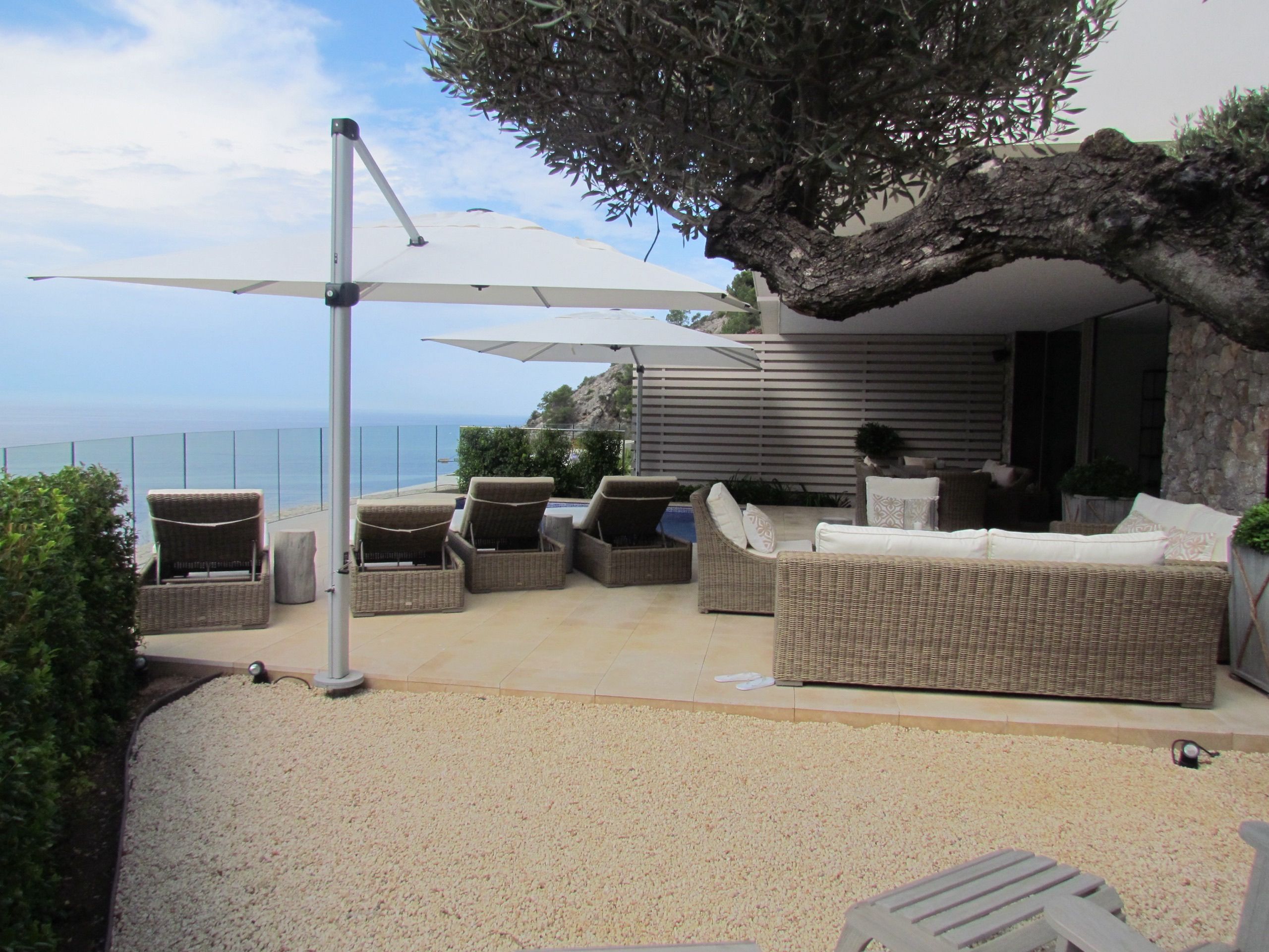 Terrace fitted with parasols in Puerto de Andratx, Mallorca