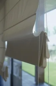 Roman blind gathered in straight folds