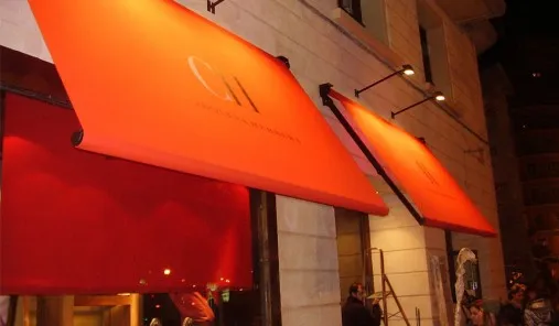 Awning screen-printed with the Carolina Herrera logo