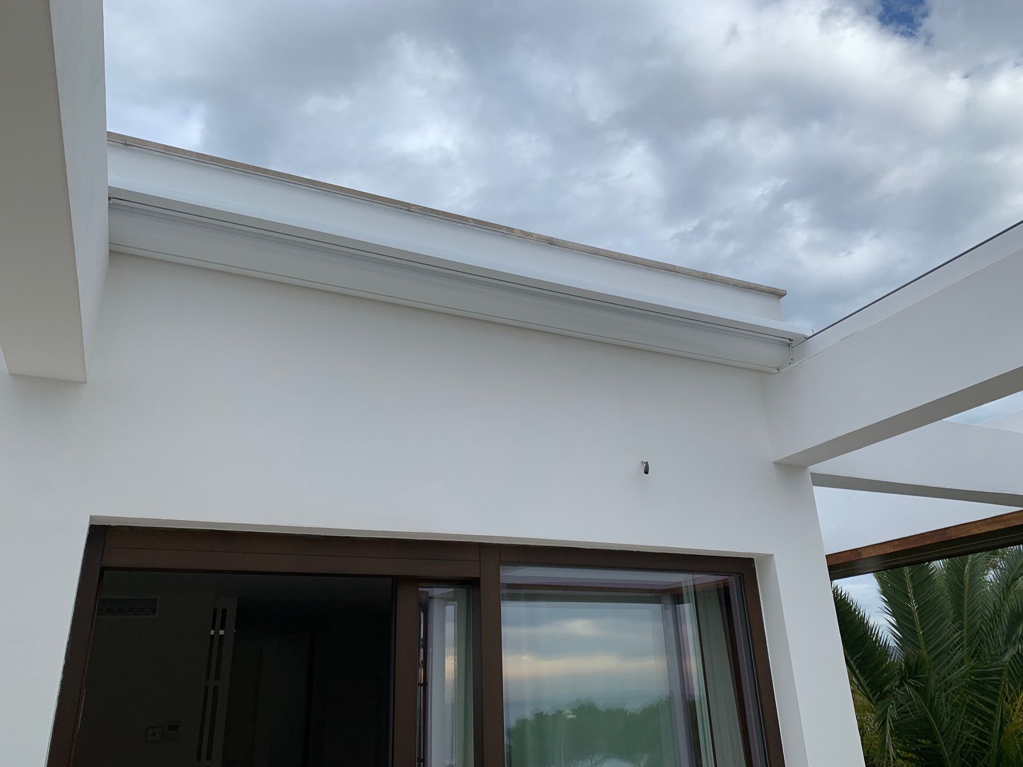 Detail of a retracted veranda awning box in Sol de Mallorca, Mallorca