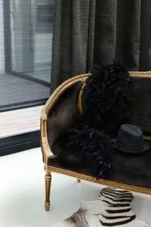 Traditional curtain with decorative detail in a modern room