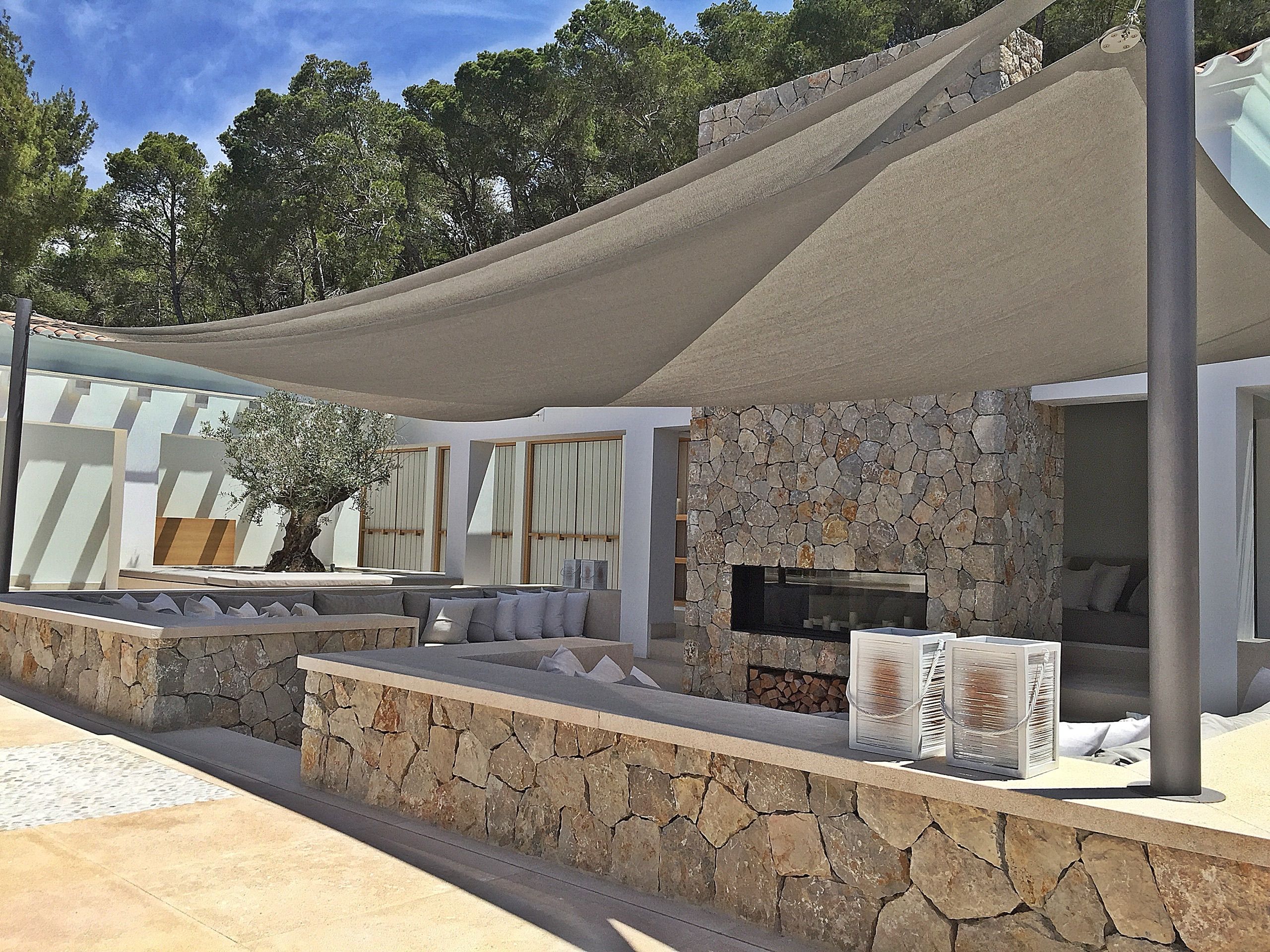 Triangular shade sail over a chill-out area in Puerto de Andratx, Mallorca