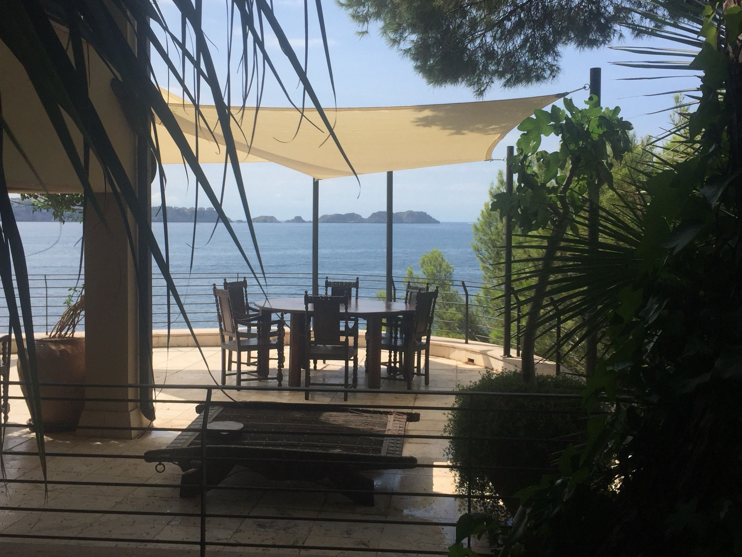 Two overlapping shade sails in different shapes in Cala Fornells, Mallorca