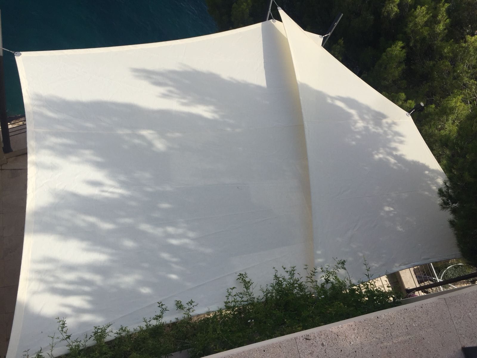 Two overlapping shade sails on a terrace in Paguera, Mallorca