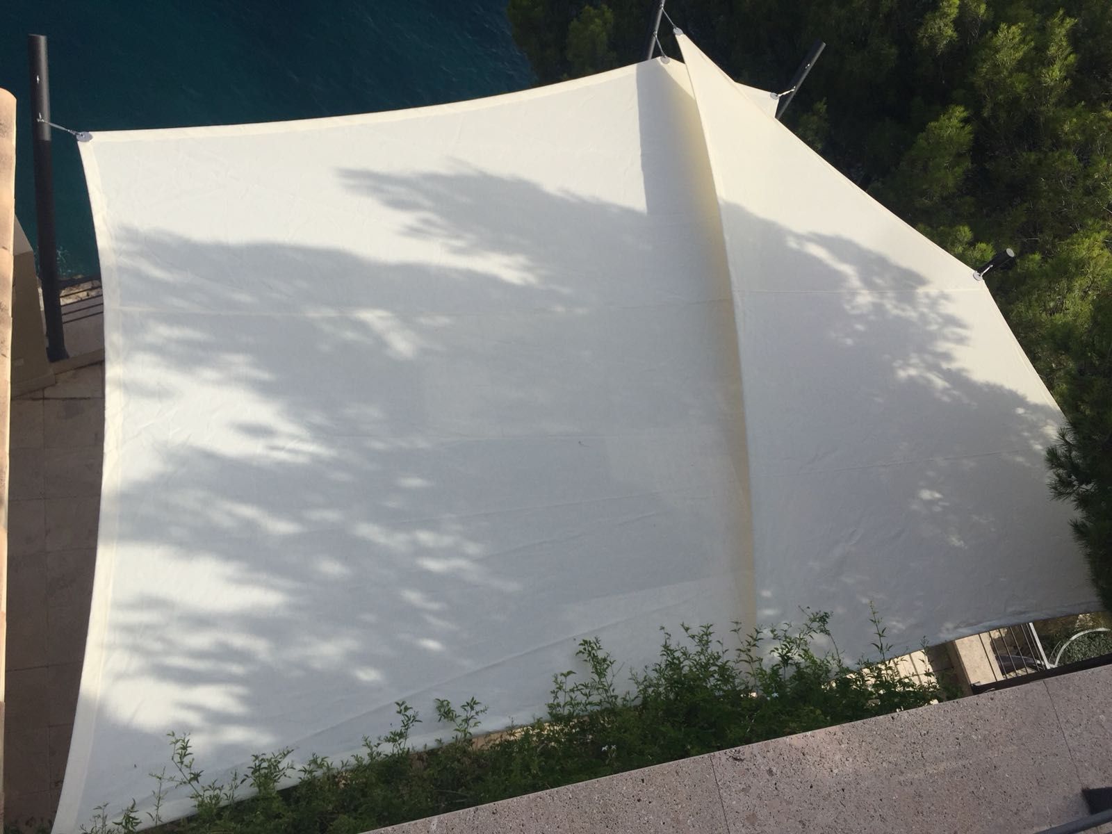 Outdoor dining area shaded by sails in Paguera, Mallorca