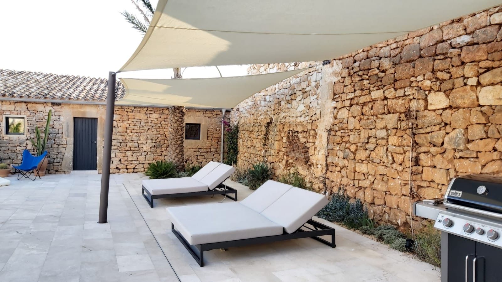 Sunbathing terrace fitted with shade sails in Santanyí, Mallorca